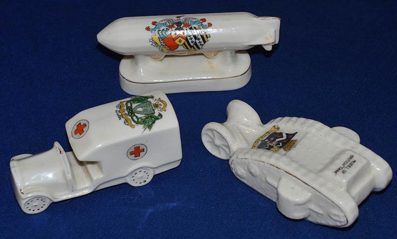 SET OF THREE WW1 CRESTED CHINA MILITARY MODELS.