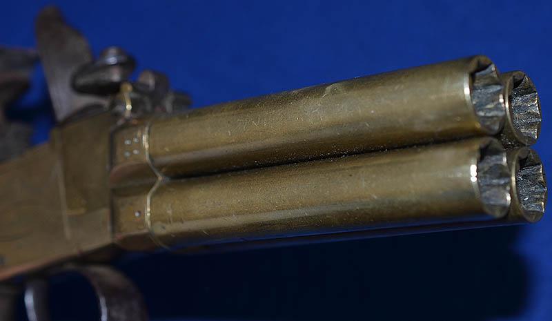 ANTIQUE ENGLISH FLINTLOCK FOUR BARREL VOLLEY PISTOL BY KETLAND.