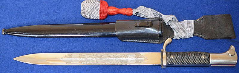 GERMAN ARMY LONG MODEL PARADE BAYONET BY EICKHORN WITH ENGRAVED BLADE,COMPLETE WITH FROG AND KNOT,MINT CONDITION.