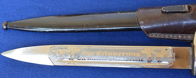 LUFTWAFE SHORT MODEL PARADE BAYONET BY SEILHEIMER COMPLETE WITH ENGRAVED BLADE AND BROWN LEATHER FROG.