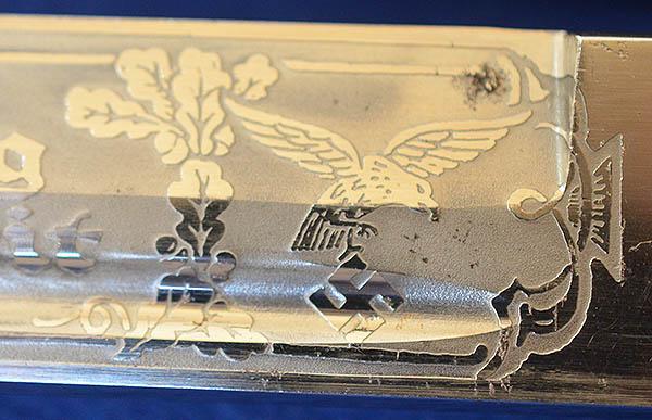 LUFTWAFE SHORT MODEL PARADE BAYONET BY SEILHEIMER COMPLETE WITH ENGRAVED BLADE AND BROWN LEATHER FROG.