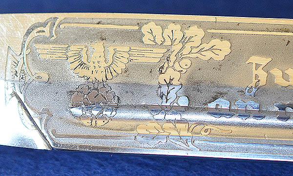 LUFTWAFE SHORT MODEL PARADE BAYONET BY SEILHEIMER COMPLETE WITH ENGRAVED BLADE AND BROWN LEATHER FROG.