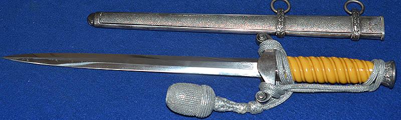 GERMAN ARMY OFFICERS DAGGER 1935 MODEL BY HOLLER COMPLETE WITH SILVER KNOT.