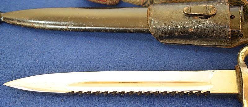 THIRD REICH NCO SHORT MODEL FIRE SERVICE BAYONET WITH MINT SAWBACK BLADE COMPLETE WITH FROG AND KNOT.