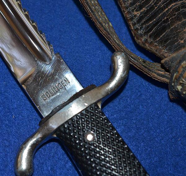 THIRD REICH NCO SHORT MODEL FIRE SERVICE BAYONET WITH MINT SAWBACK BLADE COMPLETE WITH FROG AND KNOT.