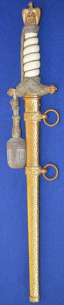 THIRD REICH NAVAL DAGGER WITH HAMMERED SCABBARD AND PLAIN BLADE, COMPLETE WITH GOLD KNOT.
