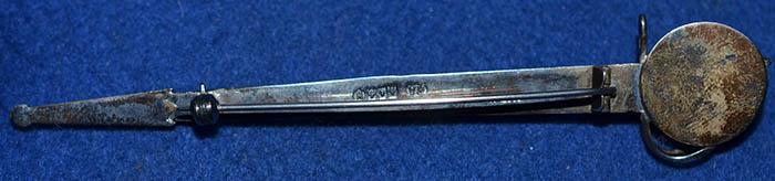 SCOTTISH SILVER KILT PIN DESIGNED A HIGHLAND SWORD.
